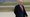 Then-President Donald Trump holds his phone as he walks towards Air Force One at Andrews Air Force Base, Md., Friday, Oct. 30, 2020. (AP)