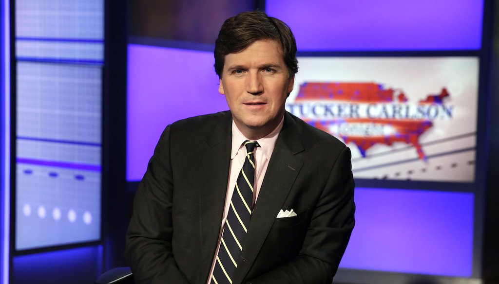 Fox News host Tucker Carlson poses in a Fox News Channel studio in New York on March 2, 2017. (AP)