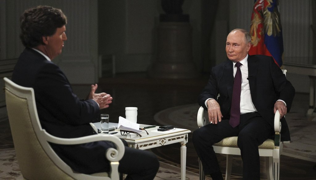 In this photo released by Sputnik news agency on Friday, Feb. 9, 2024, Russian President Vladimir Putin, right, attends an interview with former Fox News host Tucker Carlson at the Kremlin in Moscow, Russia, Tuesday, Feb. 6, 2024. (AP)