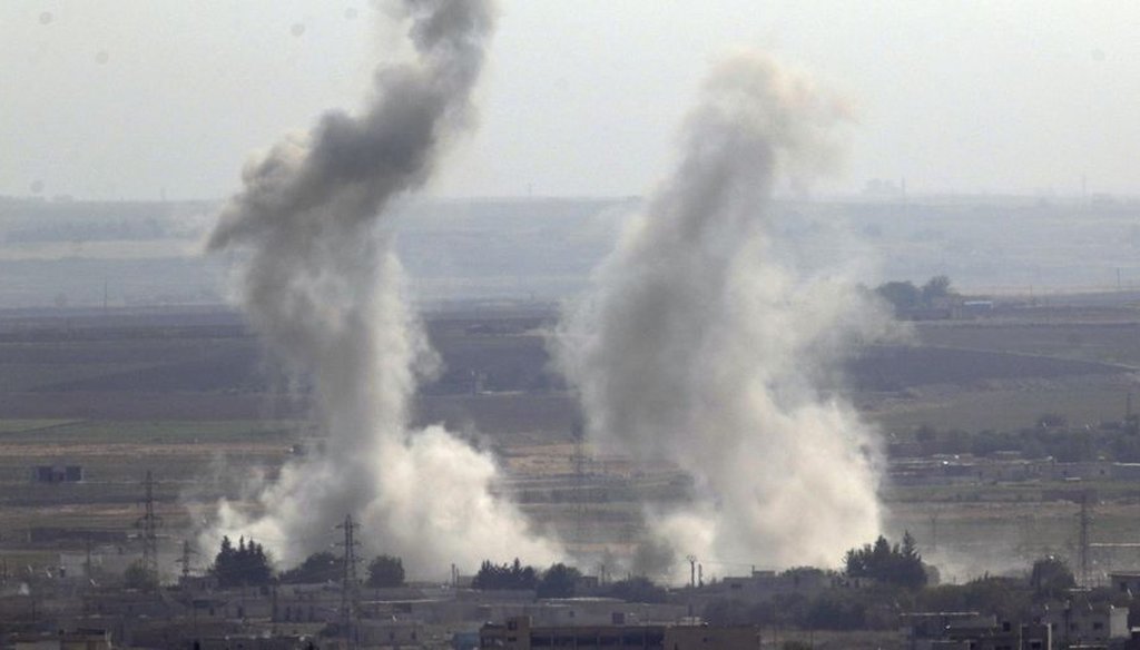 Smoke and dust billow from targets in Ras al-Ayn, Syria, caused by bombardment by Turkish forces on Oct. 15, 2019. Turkish artillery pounded suspected Syrian Kurdish positions. (AP)