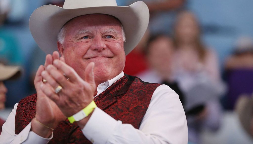 Texas Agriculture Commissioner Sid Miller applauds during the State Fair of Texas in 2016 (Andy Jacobsohn/The Dallas Morning News).