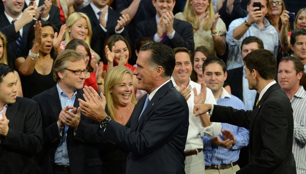 Republican Party president nominee Mitt Romney and his running mate Paul Ryan greet supporters at the party's convention in Tampa.