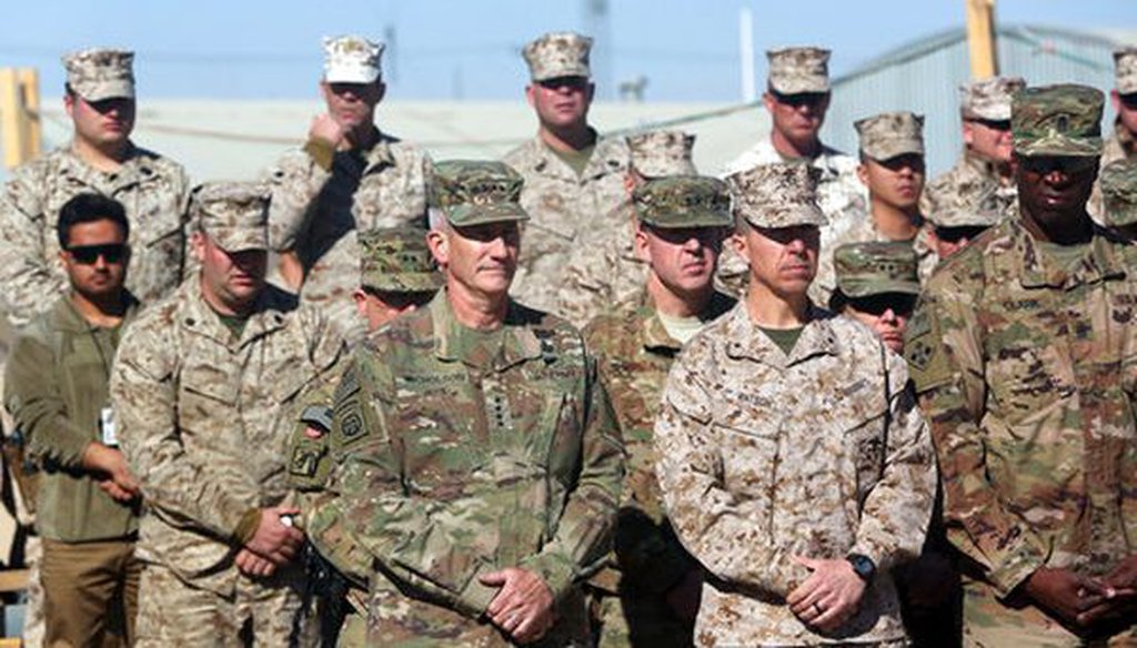 The commander of NATO and U.S. forces in Afghanistan, Army Gen. John W. Nicholson, first left, and his colleagues take part in a change of command ceremony in Afghanistan, on Jan. 15, 2018. (AP/Massoud Hossaini)