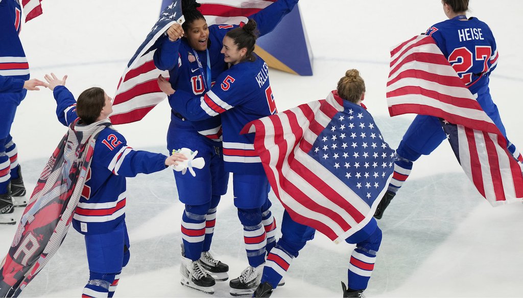 United States' Kelly Pannek (12), Laila Edwards (10), Megan Keller (5) and Taylor Heise (27) celebrate after winning the women's ice hockey gold medal game against Canada at the 2026 Winter Olympics, in Milan, Italy, Feb. 19, 2026. (AP)
