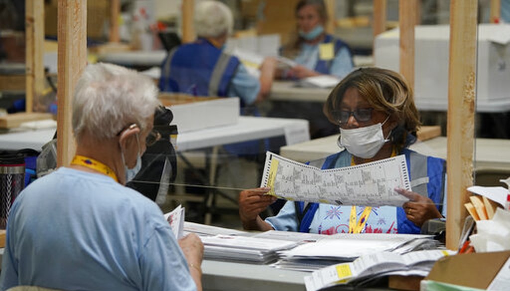 Election workers process mail-in ballots during a nearly all-mail primary election Tuesday, June 9, 2020, in Las Vegas. (AP)
