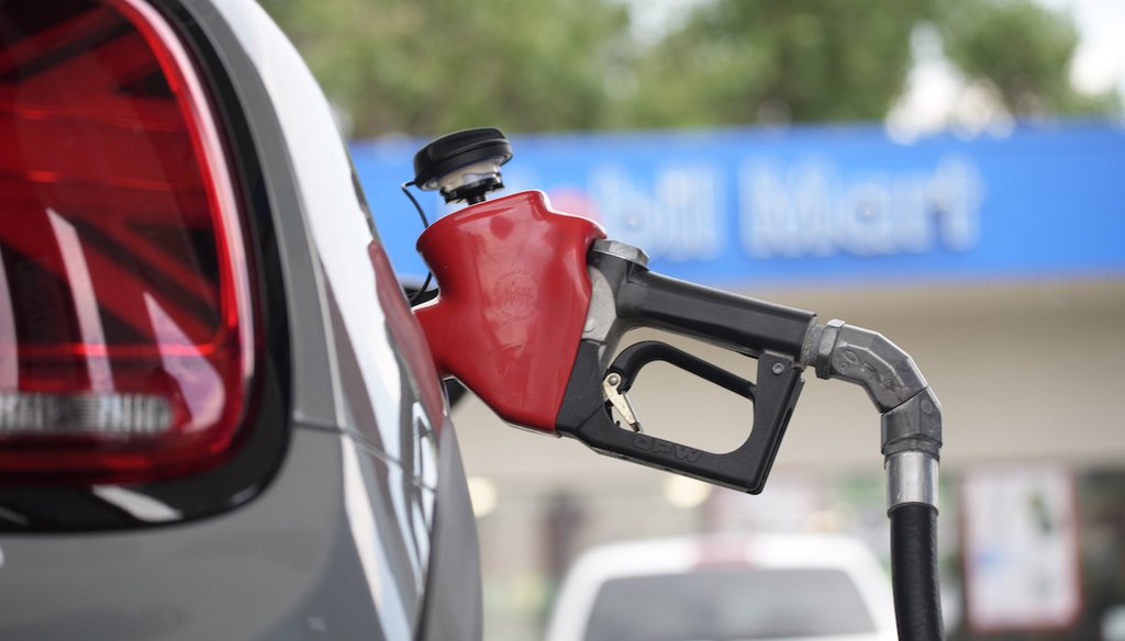 A car is filled with gasoline at a Mobil station in Littleton, Colo., Aug. 29, 2021. (AP)