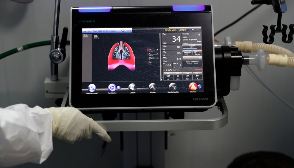 A ventilator's monitor displays oxygen entering the lungs of a COVID-19 patient in an intensive care unit of the National Hospital in Itaugua, Paraguay,  March 17, 2021