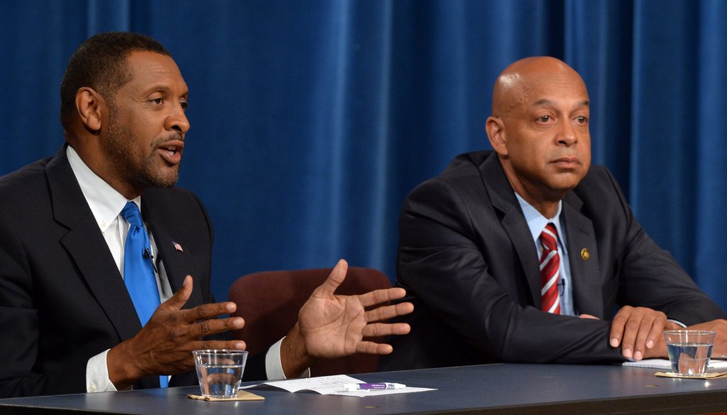 Vernon Jones, right, makes a point during a recent debate