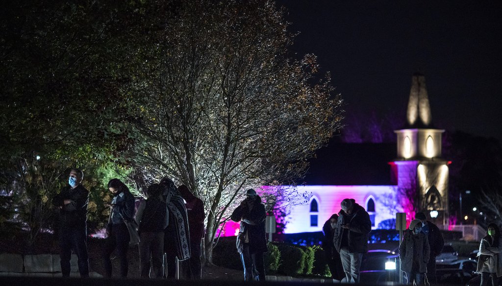 Voters wait in line outside the municipal offices before polls close on Election Day in Shelby Township, Mich., in Macomb County, Nov. 3, 2020. (AP)