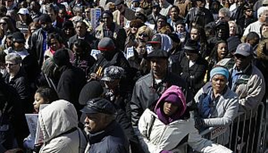 Residents participate in the annual Bridge Crossing Ceremony in Selma, Ala., Sunday, March 3, 2013, commemorating the 1965 march, which prompted Congress to pass the Voting Rights Act. (AP Photo/Dave Martin)