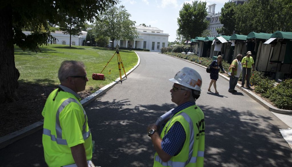 A construction crew starts work on a renovation of the White House's West Wing  on Aug. 4, 2017.