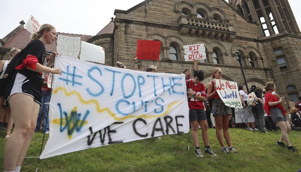 West Virginia University students lead a protest against budget cuts outside Stewart Hall in Morgantown, W.Va., on Aug. 21, 2023. (AP)