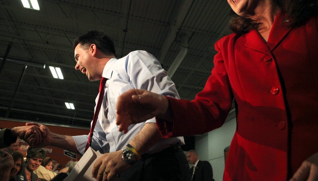Gov. Scott Walker and Lt. Gov. Rebecca Kleefisch greet supporters at a campaign event. Both are facing recall elections June 5, 2012.