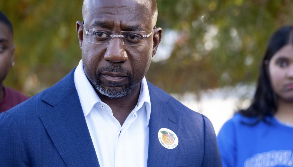U.S. Sen, Raphael Warnock, D-Ga., speaks to journalists after voting on the first day of early voting in Atlanta on Oct. 17, 2022. (AP)