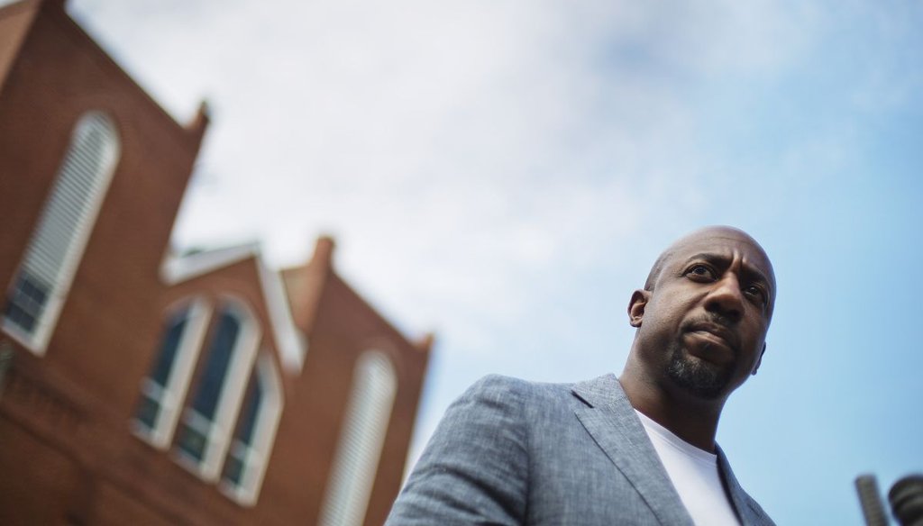 Raphael Warnock outside the Ebenezer Baptist Church in Atlanta on July 30, 2015, a few months after giving a sermon that later drew criticism in an ad by his Senate opponent, Herschel Walker. (AP)