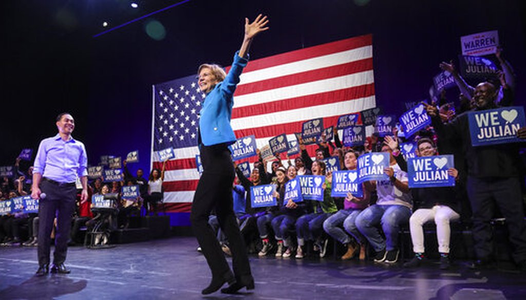 Democratic presidential candidate Sen. Elizabeth Warren, D-Mass., gets the endorsement of former presidential candidate Julian Castro at a rally in Brooklyn, NY. (AP Photo/Bebeto Matthews)