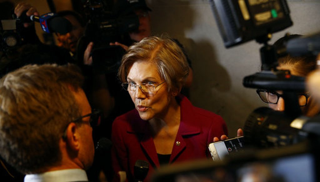 Sen. Elizabeth Warren, D-Mass., speaks with reporters inside the Hart Senate Office Building on Capitol Hill. (AP Photo/Patrick Semansky)