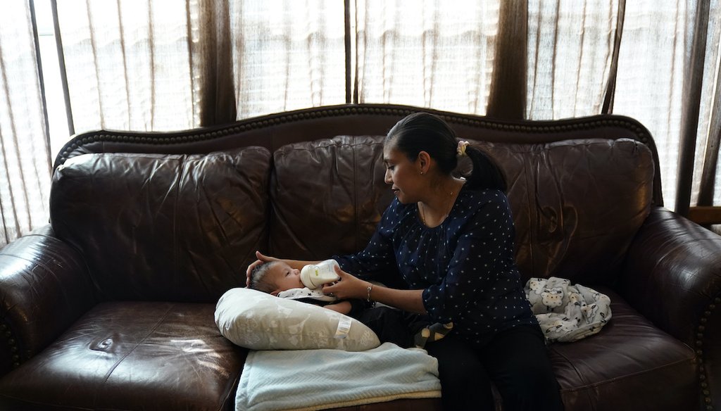 Olivia Godden feeds her infant son, Jaiden, baby formula on May 13, 2022, at their home in San Antonio. (AP)