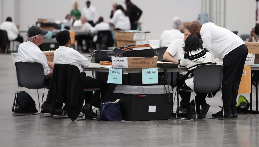 Workers tabulate absentee ballots Oct. 31, 2024, at the Huntington Place convention center in Detroit. (AP)