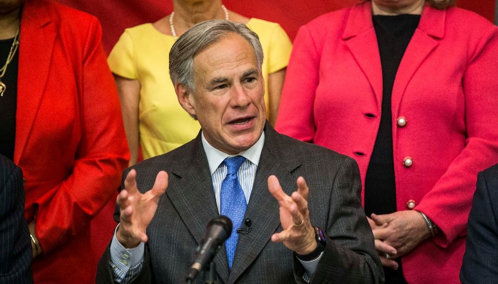 Gov. Greg Abbott about to sign into law House Bill 3, the sweeping school finance package at Parmer Lane Elementary School in Austin on Tuesday, June 11, 2019. [LOLA GOMEZ / AMERICAN-STATESMAN]