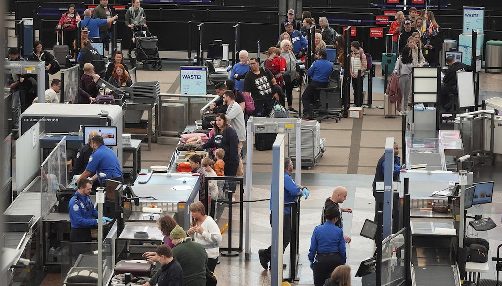 Travelers pass through the south security checkpoint in Denver International Airport, Nov. 26, 2024. TSA agents have worked unpaid through past government shutdowns. (AP)