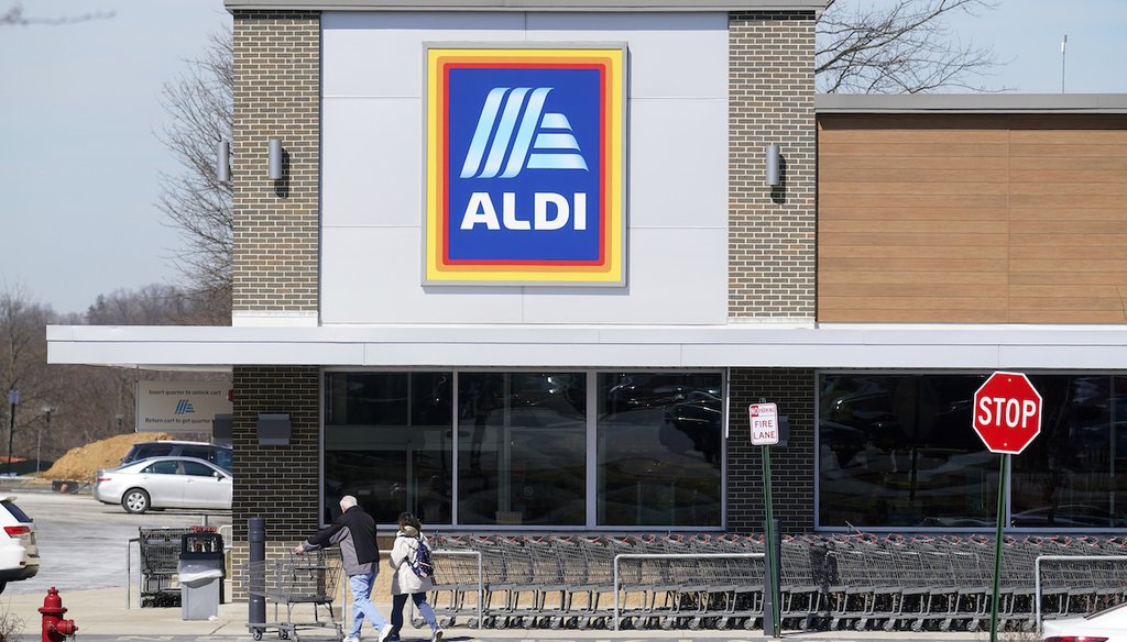 Customers walk into an Aldi supermarket in Bensalem, Pa., on March 14, 2022. (AP)
