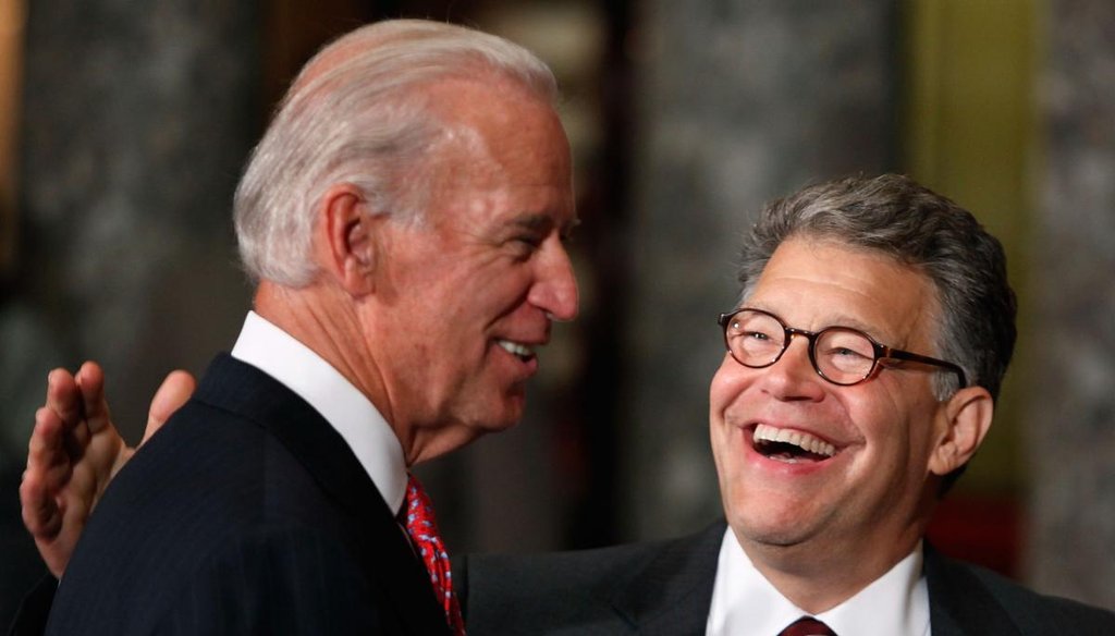 Sen. Al Franken, D-Minn., laughs during his swearing-in ceremony at the Capitol on July 6, 2009, with Vice President Joe Biden. (Getty)