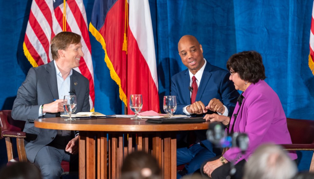 Andrew White, a Democratic gubernatorial candidate, smiles (right) at the May 11, 2018 Democratic gubernatorial debate in Austin with moderator Gromer Jeffers and candidate Lupe Valdez (James Stacy/Austin American-Statesman).