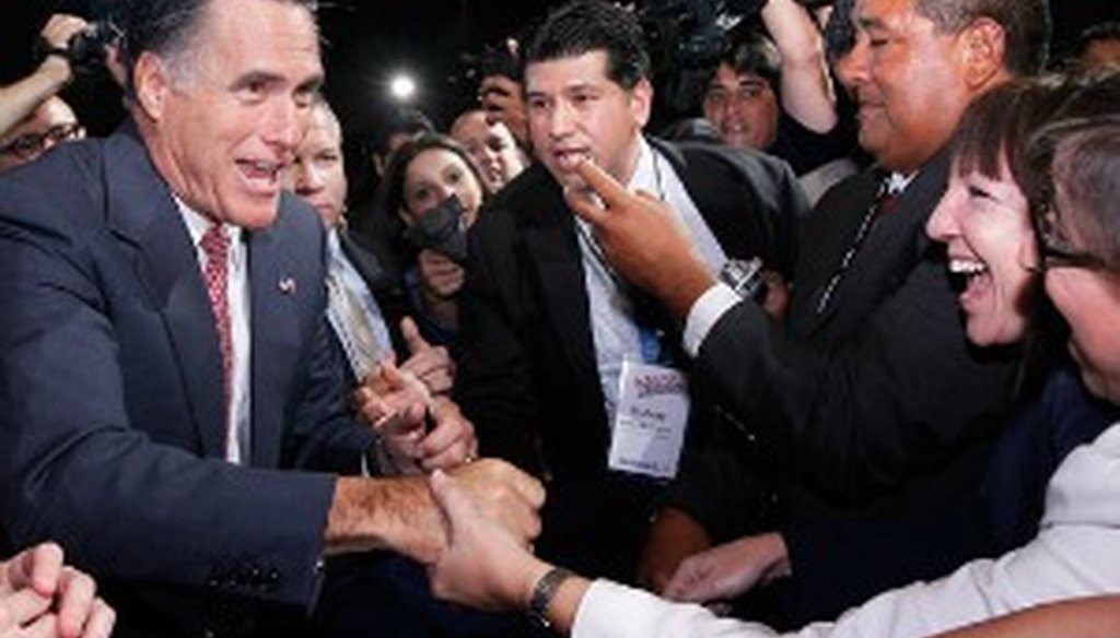 Mitt Romney greets crowd members at NALEO's conference in Florida June 21, 2012 (Photo by The Associated Press).