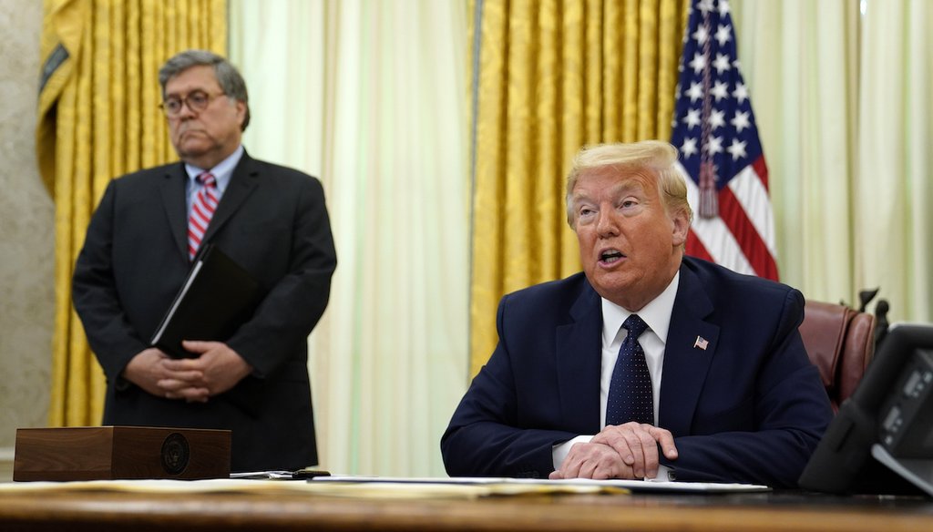President Donald Trump, flanked by Attorney General Bull Barr, speaks May 28, 2020, in the Oval Office. (AP)