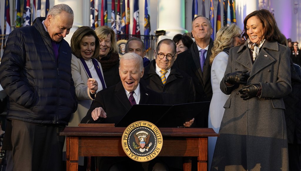President Joe Biden reacts after signing the Respect for Marriage Act on Dec. 13, 2022, at the White House.. (AP)
