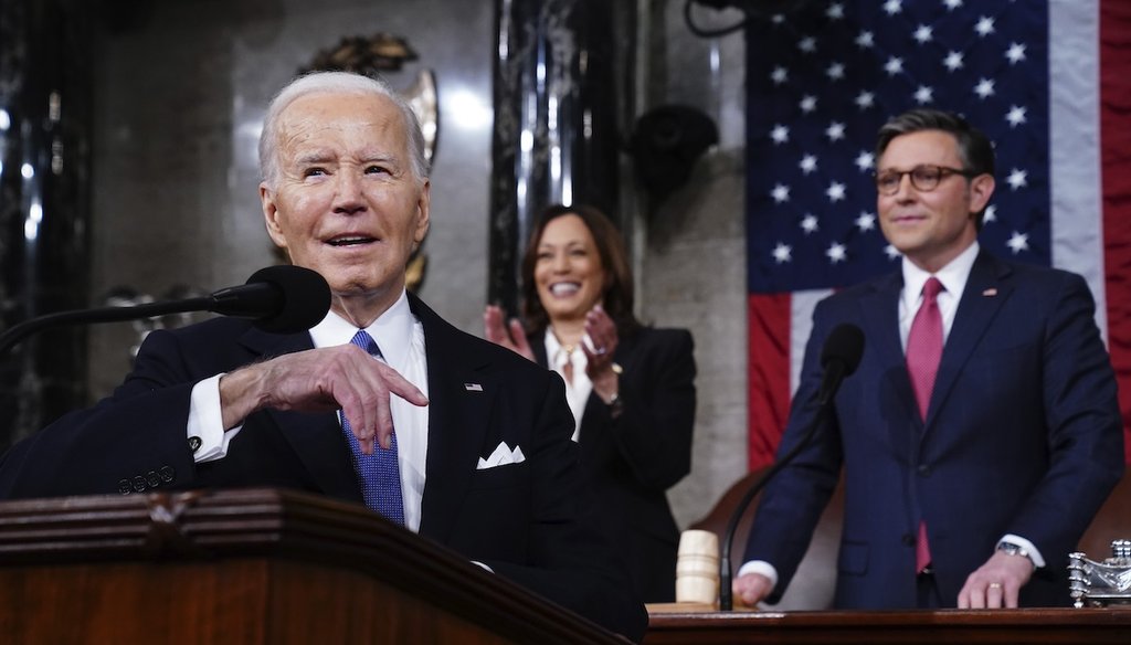 President Joe Biden delivers the State of the Union on March 7, 2024, in Washington. Vice President Kamala Harris, and House Speaker Mike Johnson, R-La., watch from the back. (AP)