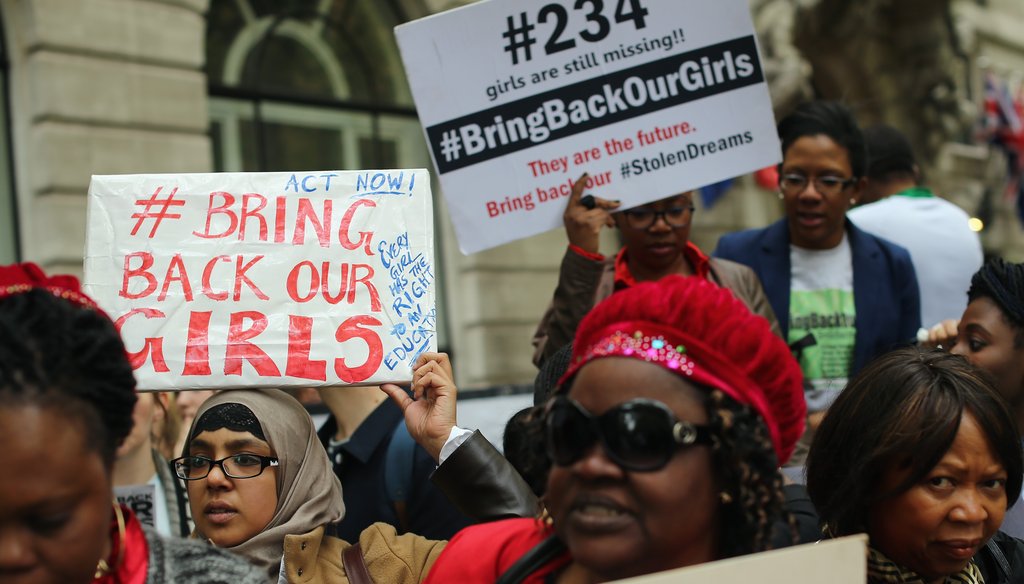 Protesters around the world, including these in London, are demanding the return of 276 kidnapped school girls in Nigeria. Getty photo.