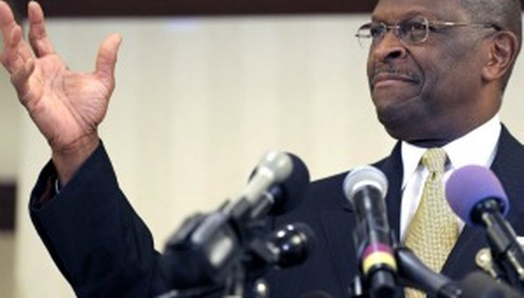 Herman Cain holds forth at a November 2011 stop in Virginia (AP photo).