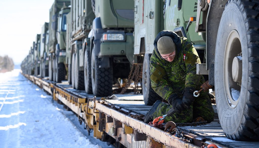 Military equipment is loaded onto a train in May 2023 in Canada in preparation for an annual military exercise. (Canada Department of National Defence)