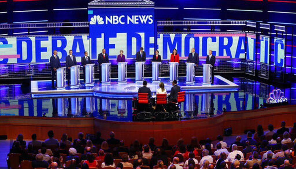 Democratic presidential candidates before the start of a Democratic primary debate Wednesday, June 26, 2019, in Miami (AP).
