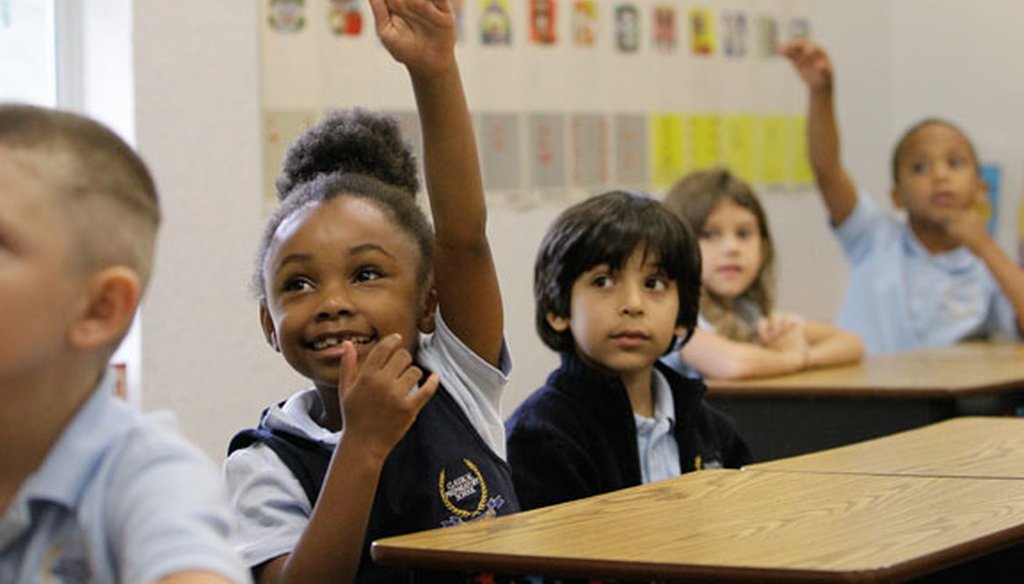 First-grade students participate in class at Classical Prep, a charter school in Spring Hill. (Tampa Bay Times file photo, 2014)