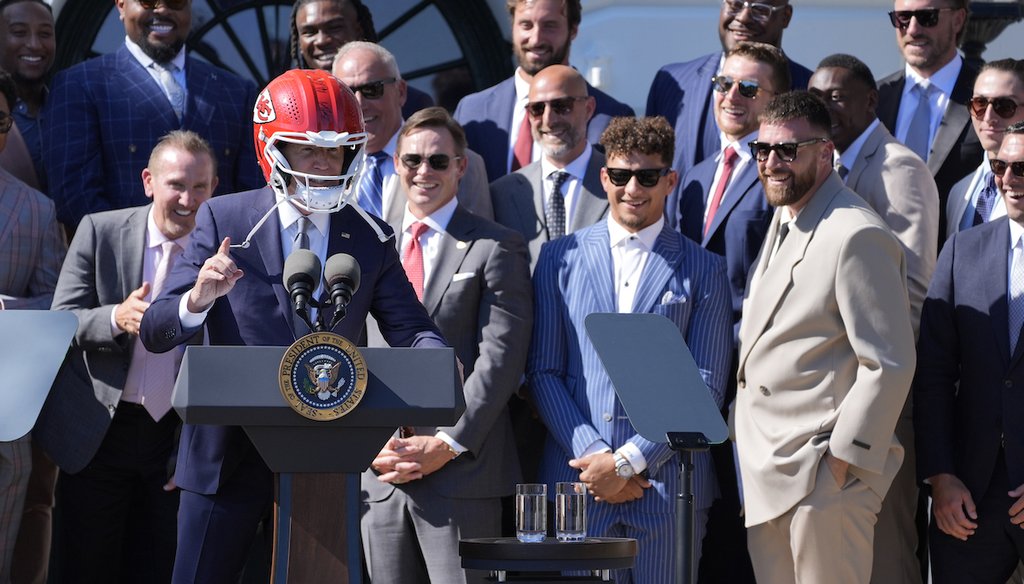 President Joe Biden wears a Chiefs helmet May 31, 2024, as he speaks during an event with the Super Bowl-champion Kansas City Chiefs on the South Lawn of the White House to celebrate their championship season. (AP)