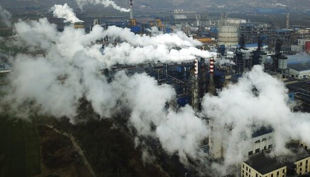 In this Nov. 28, 2019 file photo, smoke and steam rise from a coal processing plant in Hejin in central China's Shanxi Province. (AP)