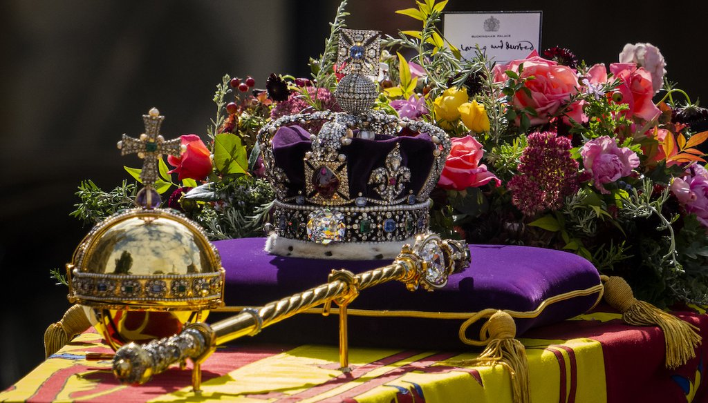 The coffin of Queen Elizabeth II leaves after the funeral service at Westminster Abbey in central London, Sept. 19, 2022. (AP)