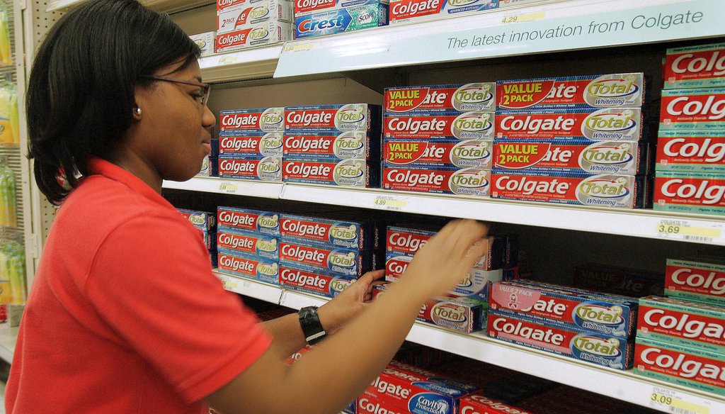 Colgate toothpaste, like many brands, contains fluoride, which research shows is safe for users and helps prevent tooth decay. (AP Photo/Phil Coale)