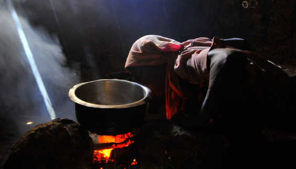 Cooking inside over fires like this is responsible for indoor air pollution in poor countries. (UN Foundation)