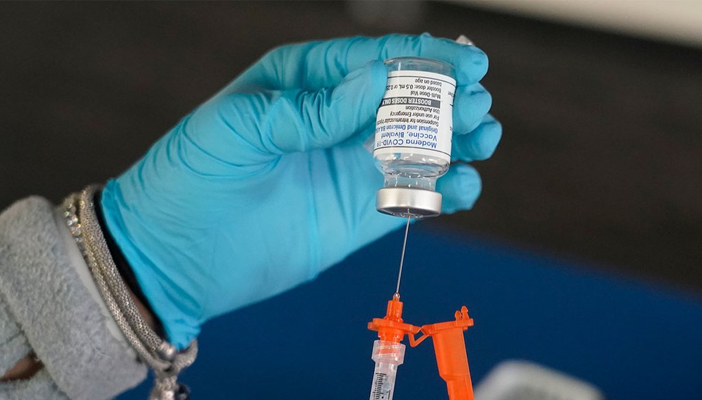 A Jackson-Hinds Comprehensive Health Center nurse loads a syringe with a Moderna COVID-19 booster vaccine at an inoculation station Nov. 18, 2022 next to Jackson State University in Jackson, Miss. (AP)