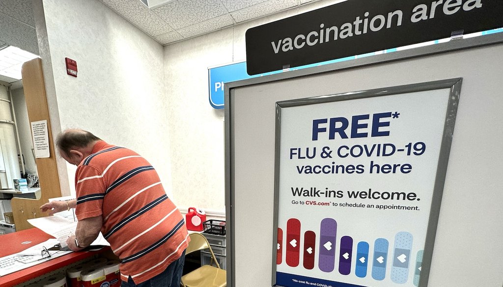 A sign for flu and COVID-19 vaccinations is displayed Sept. 13, 2023, at a pharmacy store in Palatine, Ill. (AP)