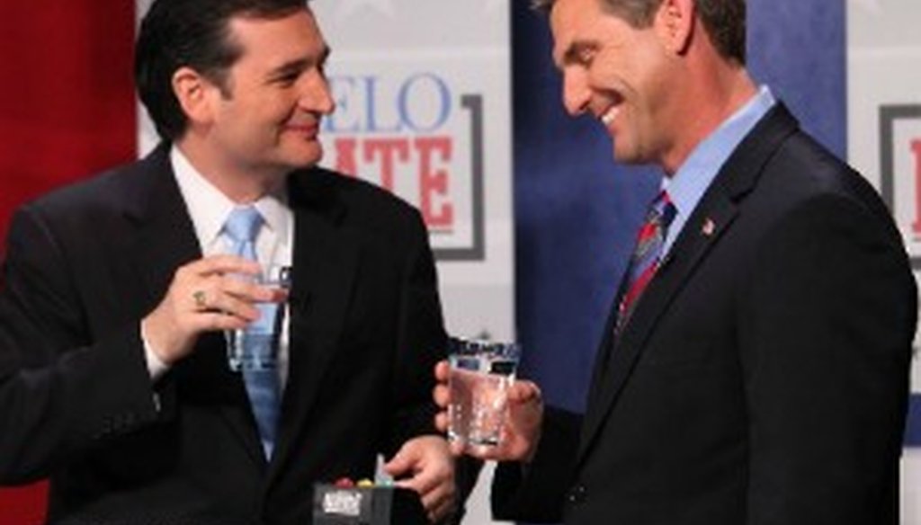 Craig James (right) grins at eventual U.S. Senate winner Ted Cruz at an April 2012 GOP debate (Photo: Brad Loper, Dallas Morning News).