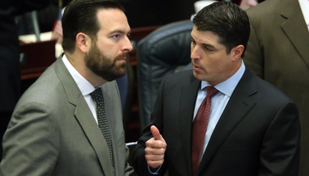 Speaker Steve Crisafulli, right, talks with Rep. Jose Diaz, R-Miami, on April 28, 2015, the same day Crisafulli adjourned the House early over a budget battle. (AP Photo) 