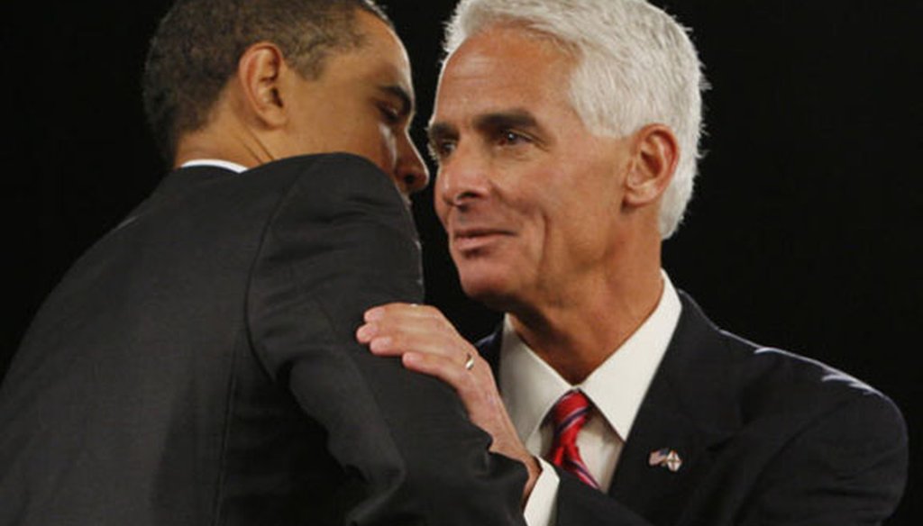 Then-Gov. Charlie Crist and President Barack Obama embrace during a pro-stimulus rally in Fort Myers on Feb. 10, 2009. (AP photo)