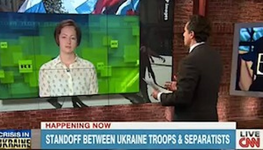 Correspondents from CNN and RT debate the situation in Ukraine.