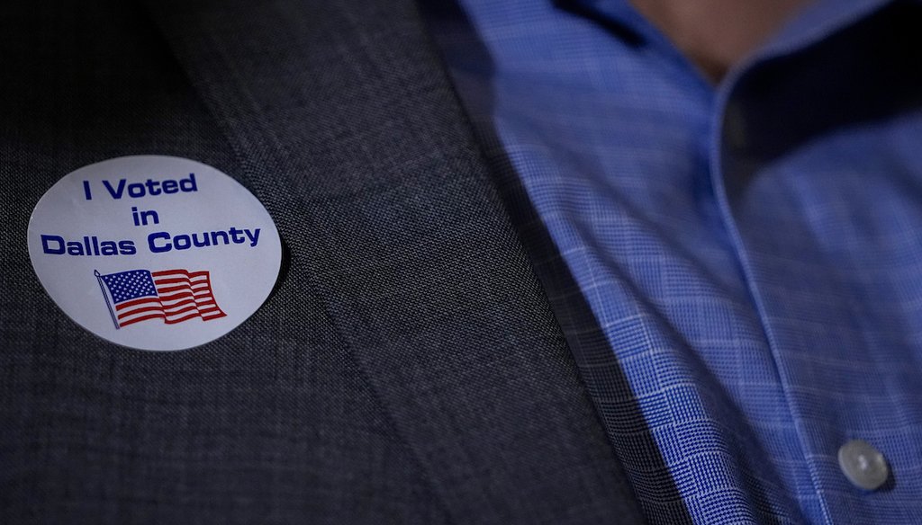 A voter wears an "I Voted in Dallas County" sticker during an election night gathering, March 5, 2024, in Dallas. (AP)