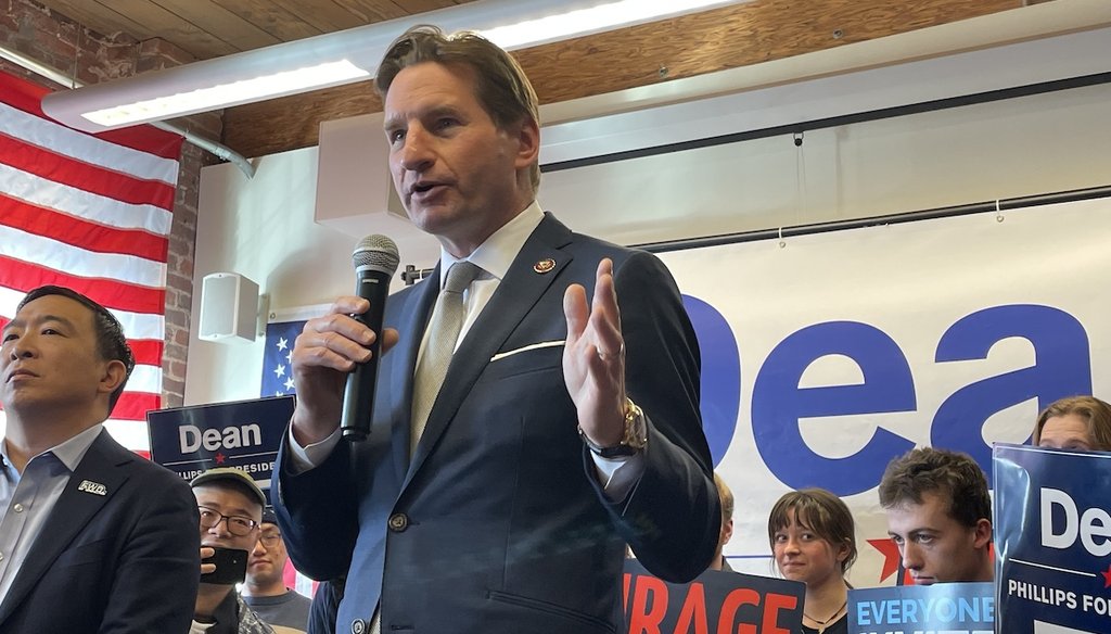 Democratic presidential candidate Dean Phillips addresses voters at an event in Manchester, N.H., with former Democratic presidential candidate Andrew Yang (left) on Jan. 18, 2024. (Louis Jacobson/PolitiFact)